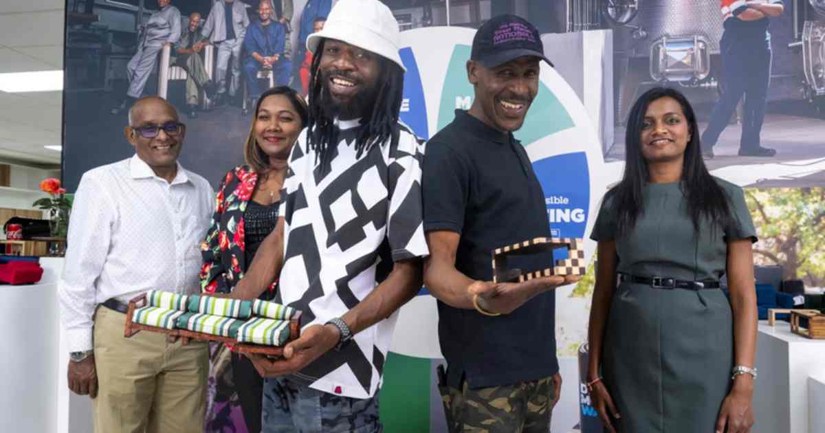 Makers 1: John Mathebula and Manyane Rantai (centre) showcase miniatures of some of their furniture designs at the graduation yesterday. With them are (from left) Furntech CEO Michael Reddy, Pernod Ricard Africa-Middle East Corporate Affairs Director Pamela Nkuna, and Pernod Ricard South Africa Sustainability and Responsibility Manager Kalashni Narainsamy. PICTURE: Philip Mostert