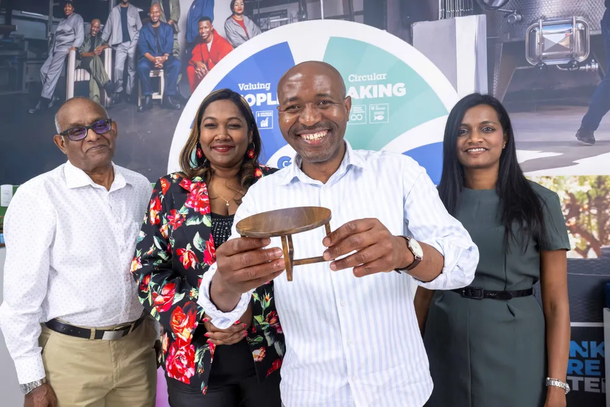 Makers 3: Graduates of the Pernod Ricard Foundation Makers Programme display miniatures of their wares, while Furntech CEO Michael Reddy, Pernod Ricard Africa CEO Sola Oke, and Corporate Affairs Director for Africa-Middle East, Pamela Nkuna, look on. PICTURE: Philip Mostert