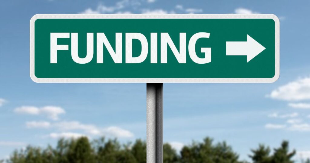 Funding sign with arrow